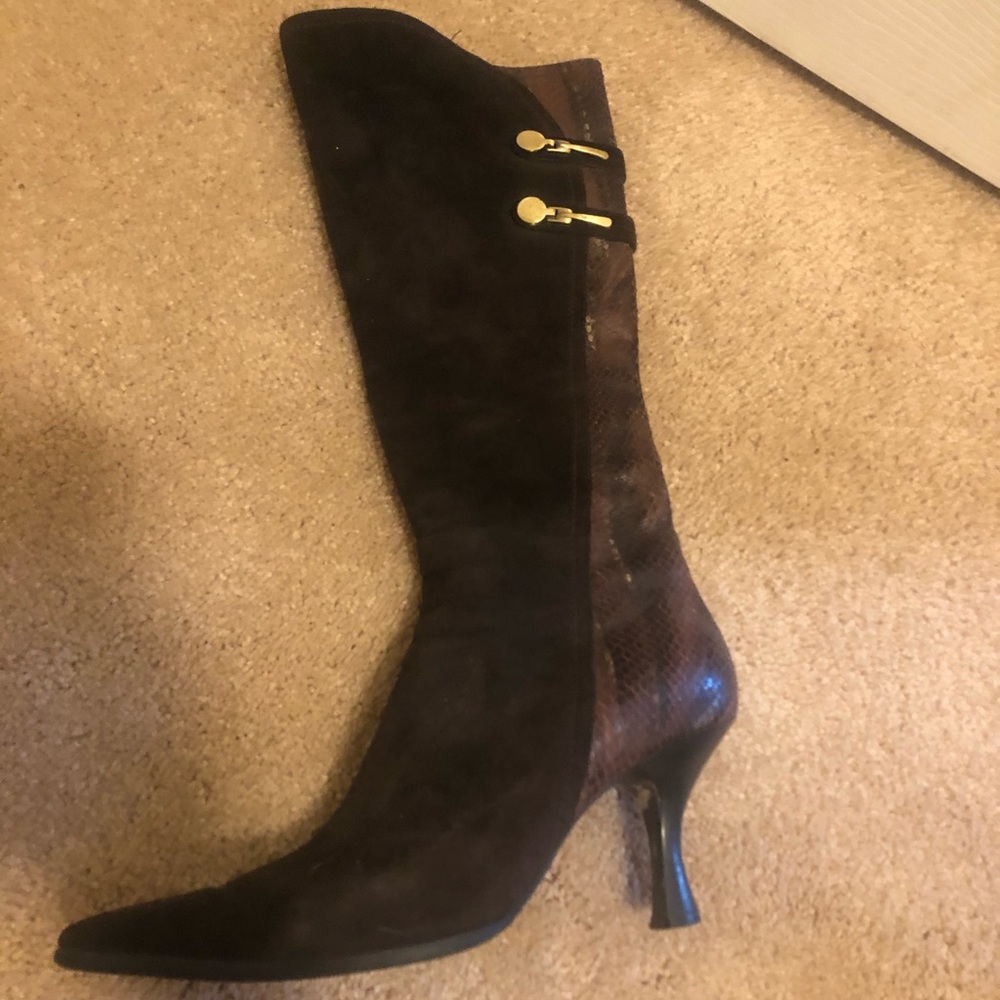 Brown suede heeled boots.